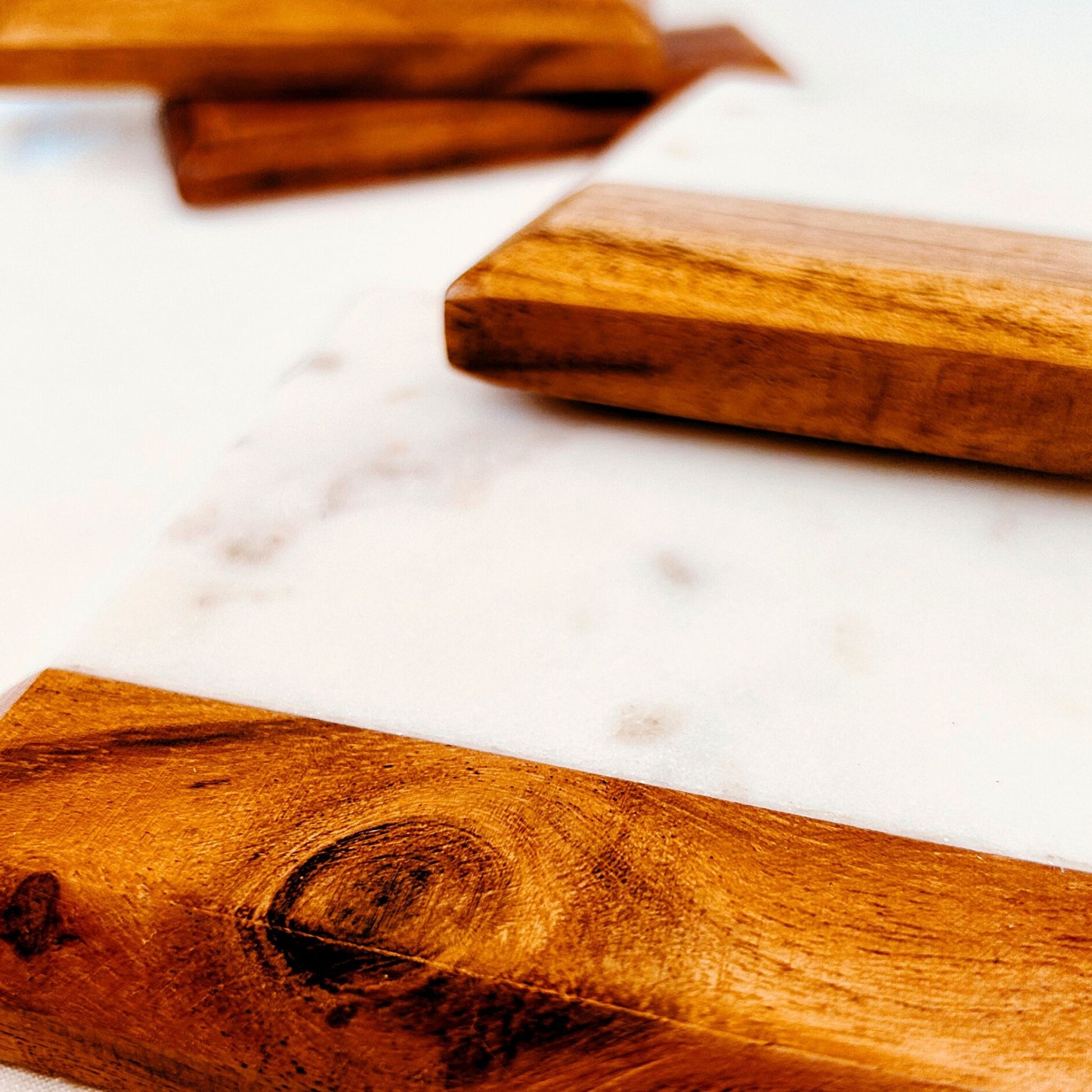 Close up of an Acacia and Marble Drink Coasters