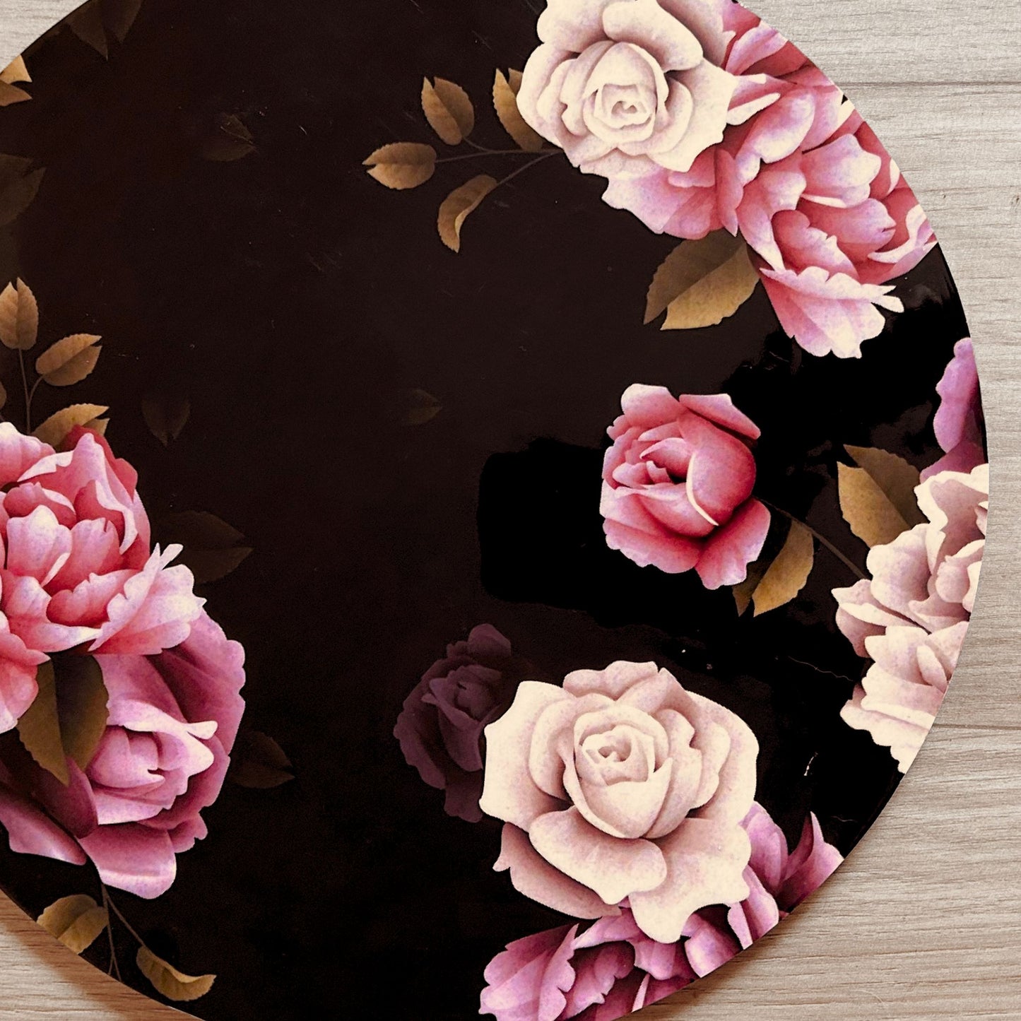 Close Up of an English Roses printed Decorative Tray or Placemat placed on a wooden backdrop.