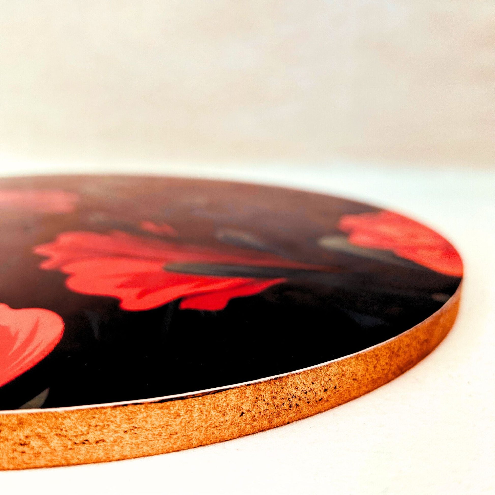 Close Up of a Floral printed Decorative Tray or Placemat placed on a white backdrop.