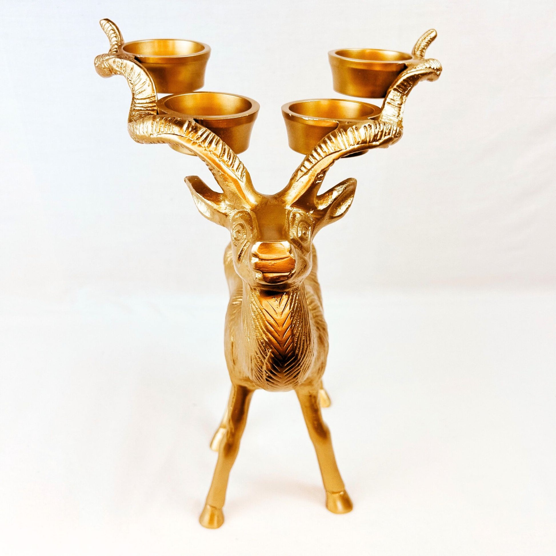 Front Shot of Stag Candle Holder in Bronze finish. 4 pillar, tealight candle holder.