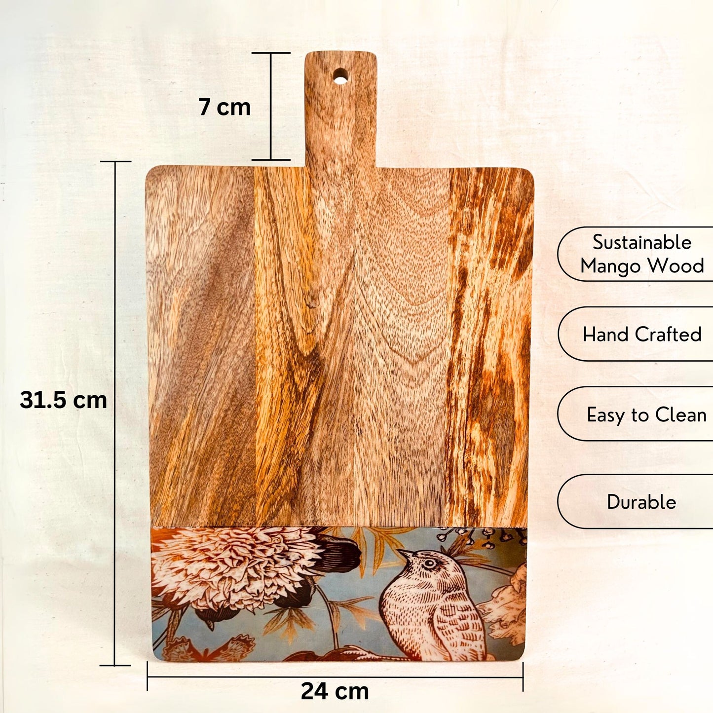 USP and product dimensions of Mango Wood Cheese Board with handle. The Charcuterie Board has a nature, bird and flowers print at the bottom of the board.