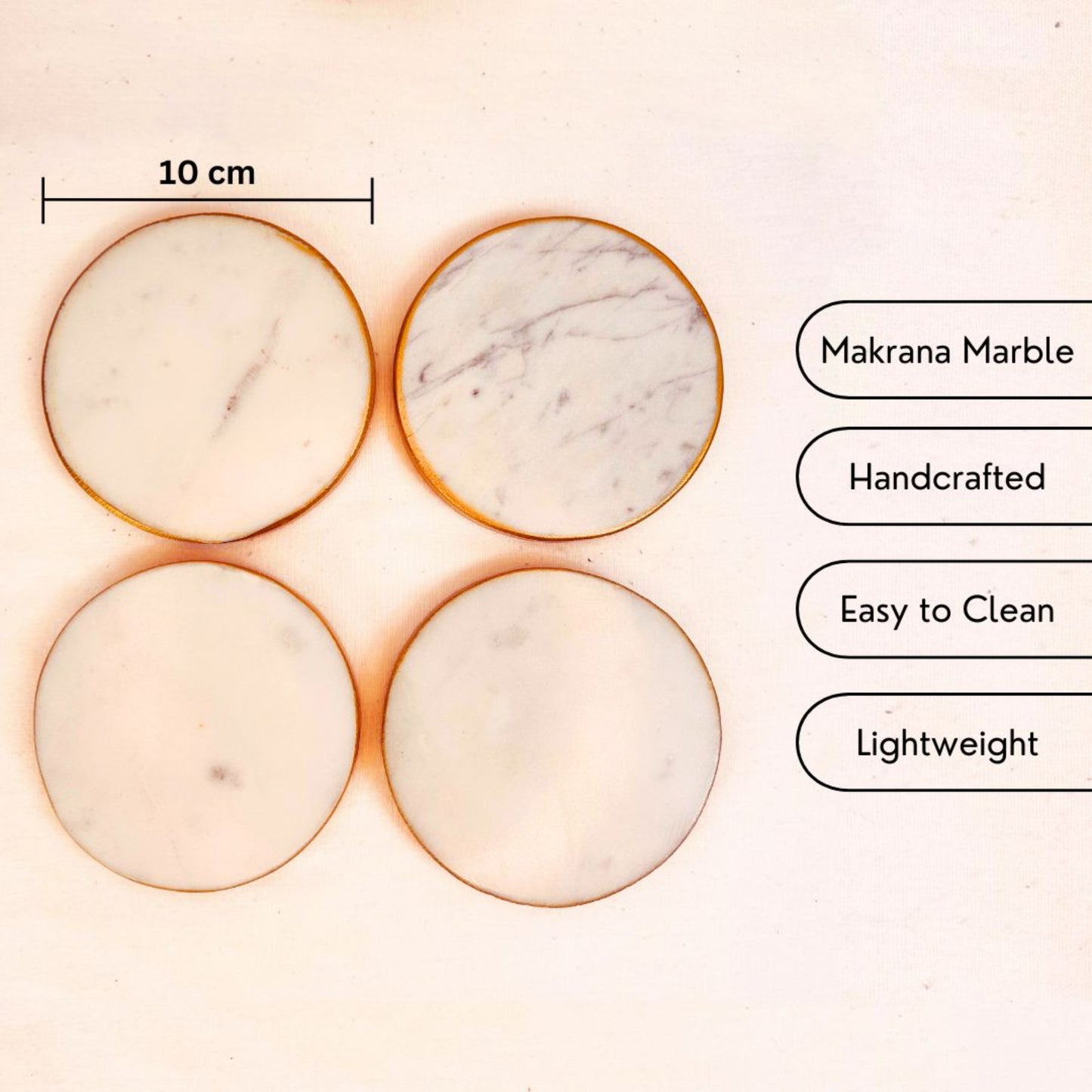 USP and dimensions of a set of 4 White round marble coasters with gold rim on a white background.