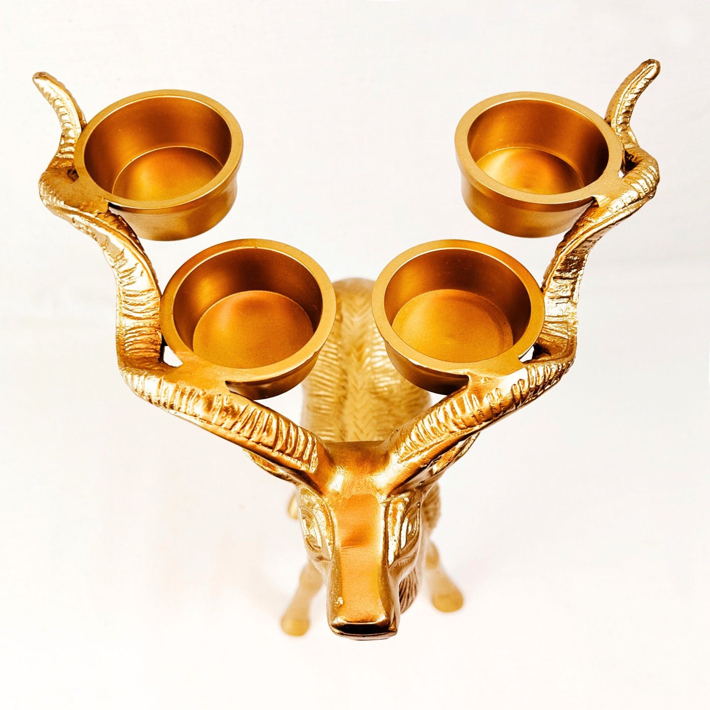 Top shot of Stag Candle Holder in Bronze finish. 4 pillar, tealight candle holder.