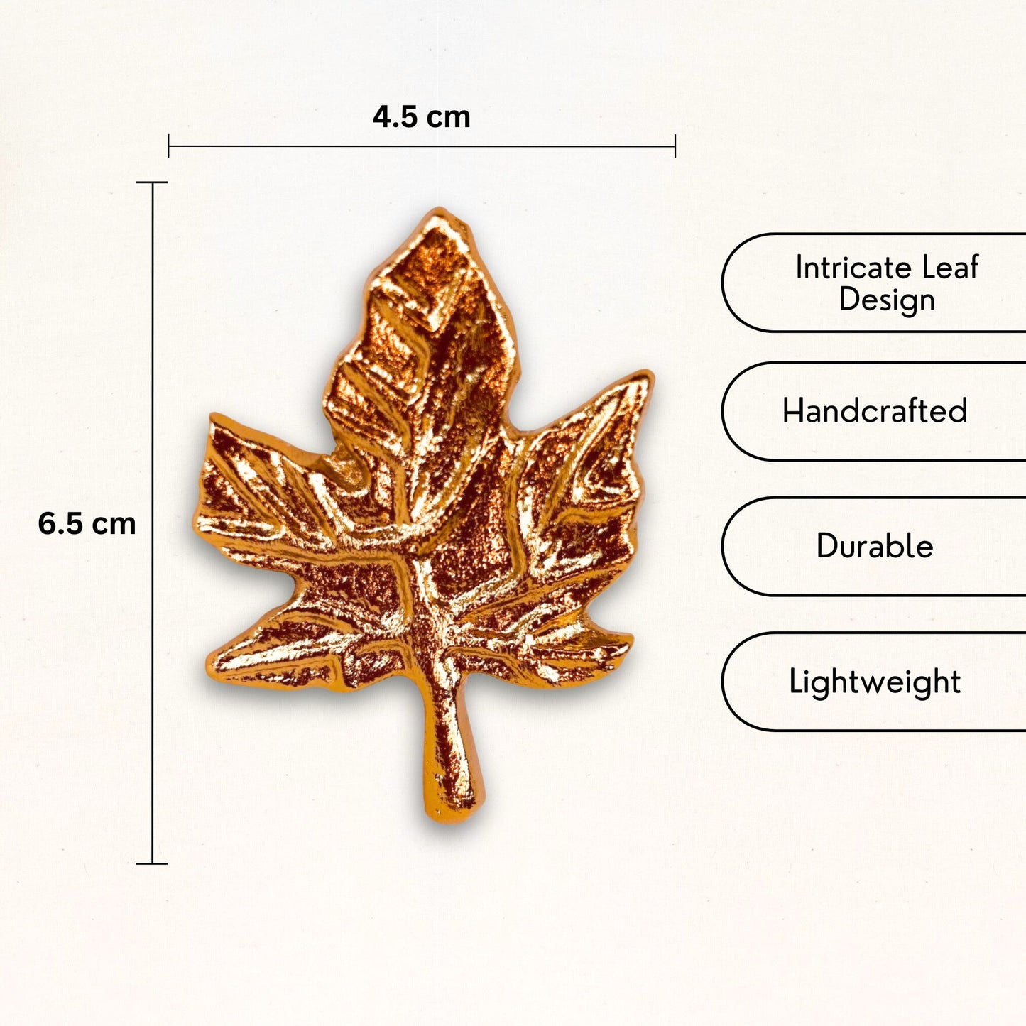 USP and dimensions of a Gold finish Leaf design Napkin Ring