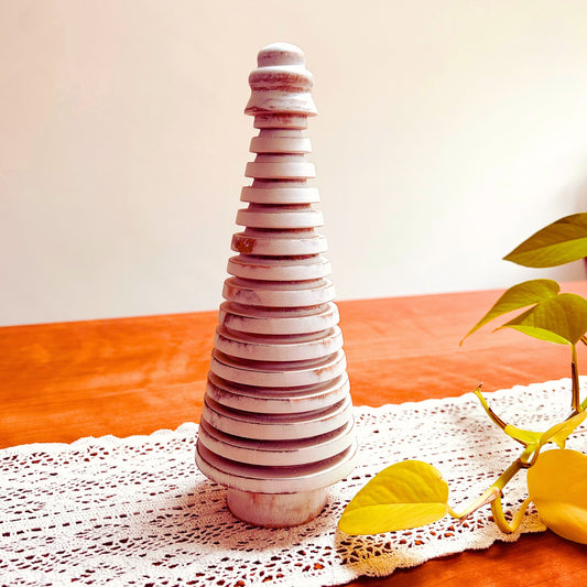 Rustic White Wooden Mango Tree in circular design kept on a table.