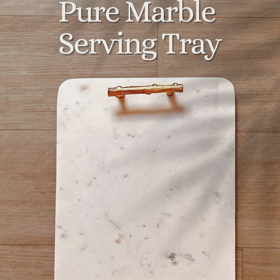 Product display of white marble serving tray