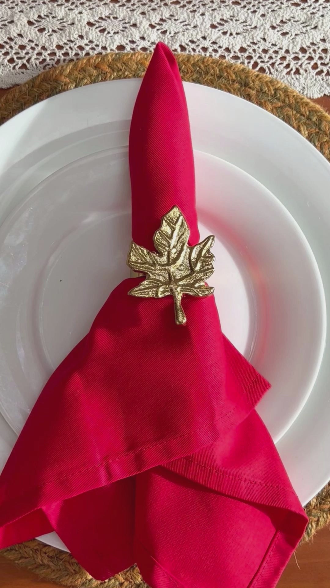 Product showcase of a Gold finish Leaf design Napkin Ring.